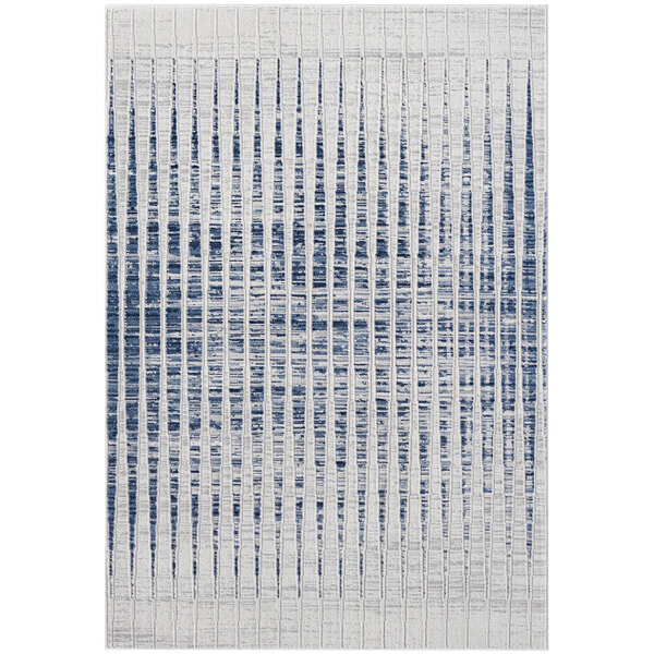 An Abani Atlas Collection blue and gray area rug with vertical lines in blue and white.
