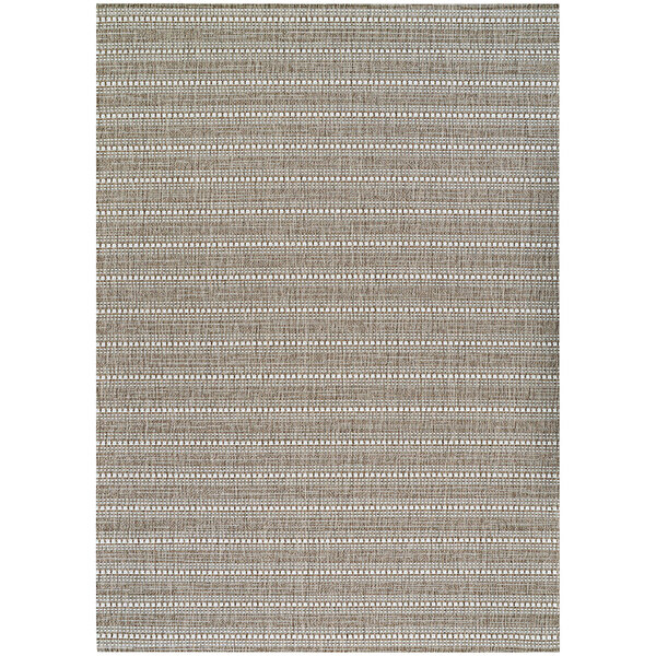 A Couristan Afuera Beachcomber area rug in beige with a pattern on it.