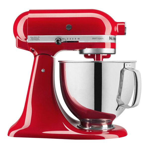 A red KitchenAid Artisan mixer with a stainless steel bowl.