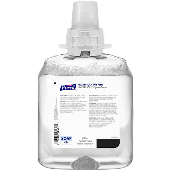 A plastic container of Purell Healthy mild foaming hand soap with a white label and cap.
