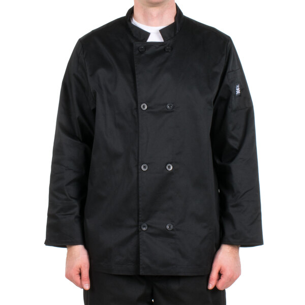 A man wearing a black Chef Revival chef coat on a white background.