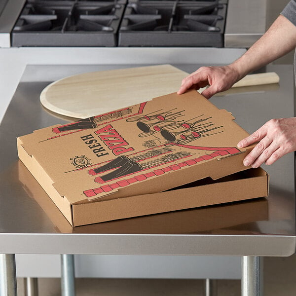 A hand opening a Choice kraft cardboard pizza box.