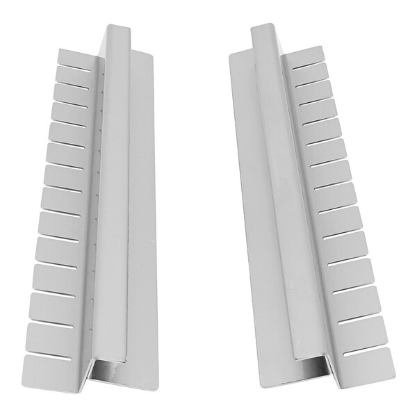 A pair of white plastic strips with holes.