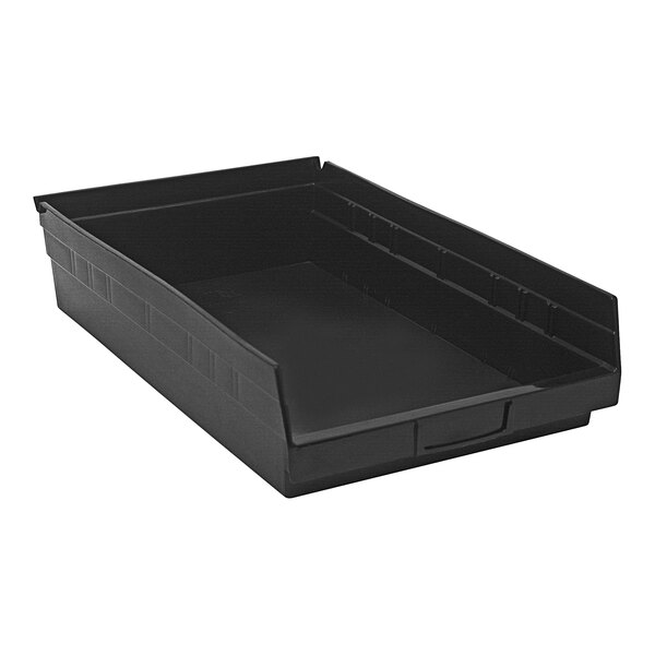 A black plastic Quantum conductive shelf bin with a black handle.