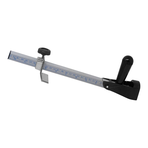 A metal ruler with a black handle.