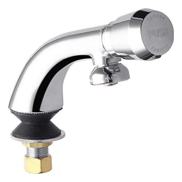 A Chicago Faucets metering faucet with a chrome finish and brass handle.