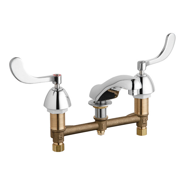 A Chicago Faucets deck-mounted faucet with brass handles and a chrome finish.