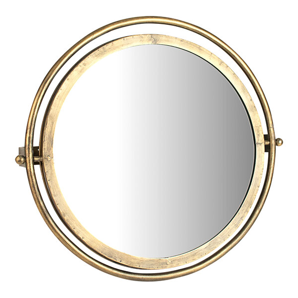 A round mirror with a gold frame.