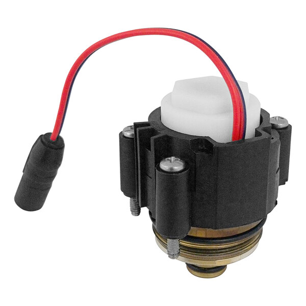 A black and red Chicago Faucets electronic solenoid valve with red wire connections.