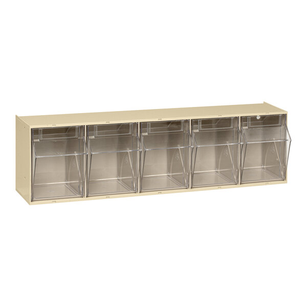 A white cabinet with clear plastic bins inside.