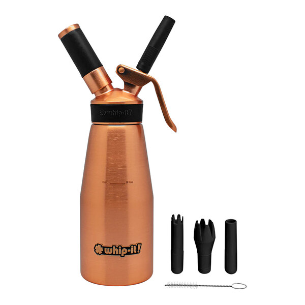 A copper colored stainless steel Whip-It cream whipper.