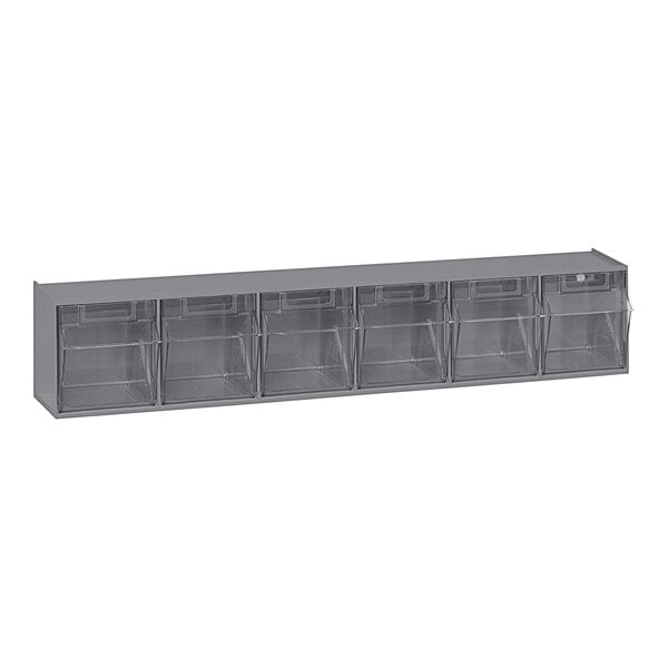 A grey rectangular Quantum Tip-Out Storage System with clear drawers containing 6 grey bins.
