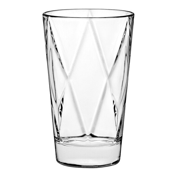A close-up of a Vidivi clear glass highball with a diamond pattern.
