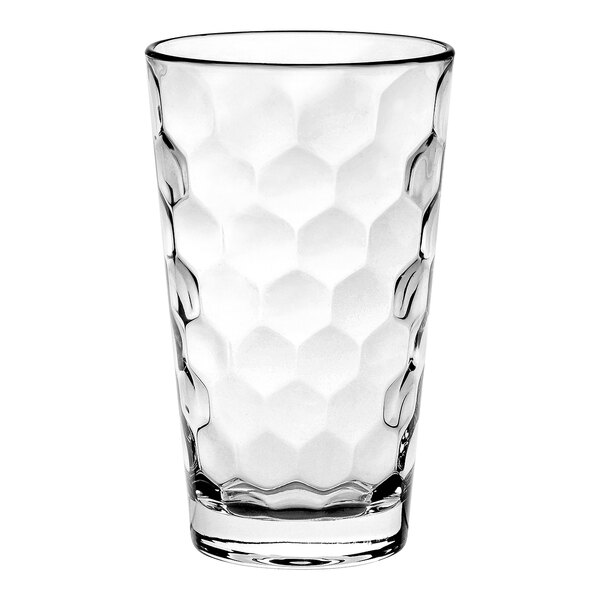 A close-up of a clear Vidivi Long Drink glass with hexagons.