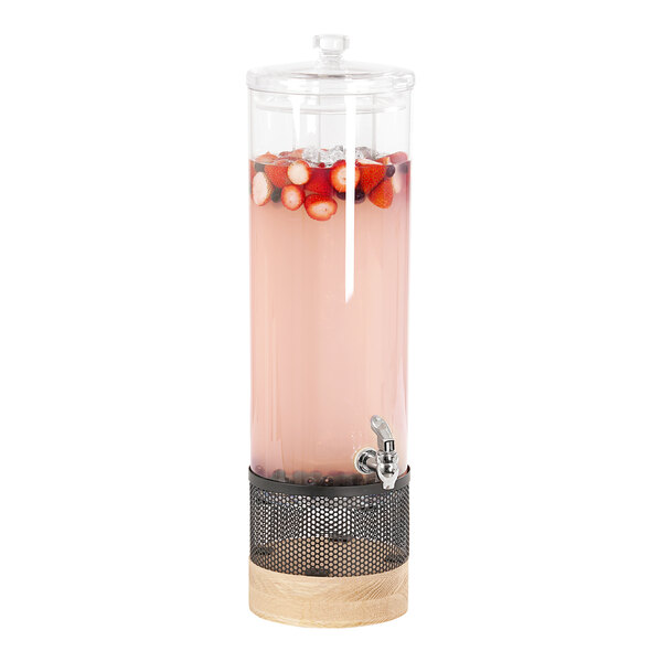 A Cal-Mil round plastic beverage dispenser with a white-washed pine wood base and metal accents.