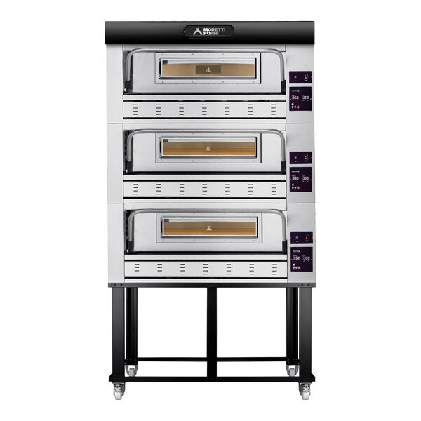 A stack of three Moretti Forni pizza deck ovens on a stand with wheels.