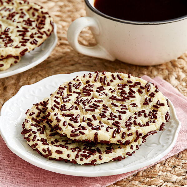 A plate of chocolate chip cookies with Bake-Stable Chocolate Sprinkles on it.