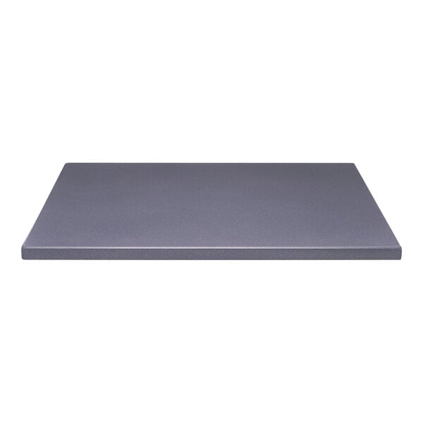 A close-up of a grey rectangular Perfect Tables outdoor table top with a smooth surface.