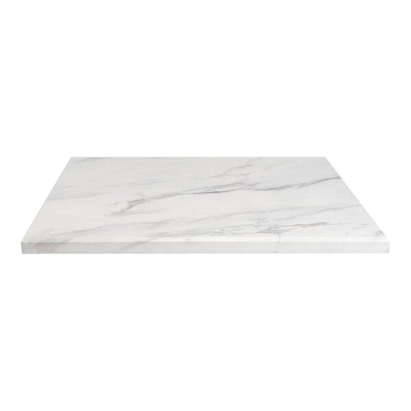 A white marble table top with a gray vein pattern.