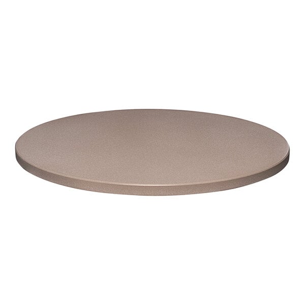 A close-up of a 30" round smooth concrete table top.