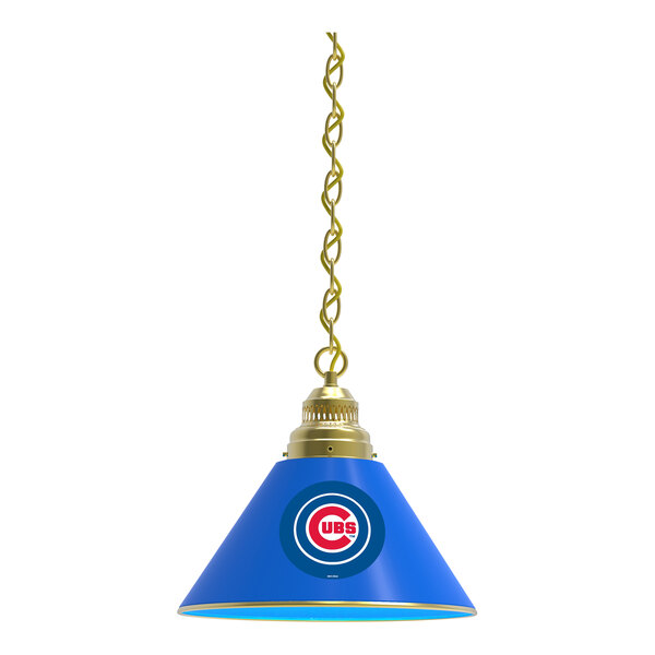 A blue lamp shade with a Chicago Cubs logo in blue and gold hanging from the ceiling.