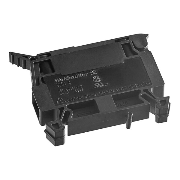 A black plastic Main Street Equipment fuse holder terminal with text and small holes.