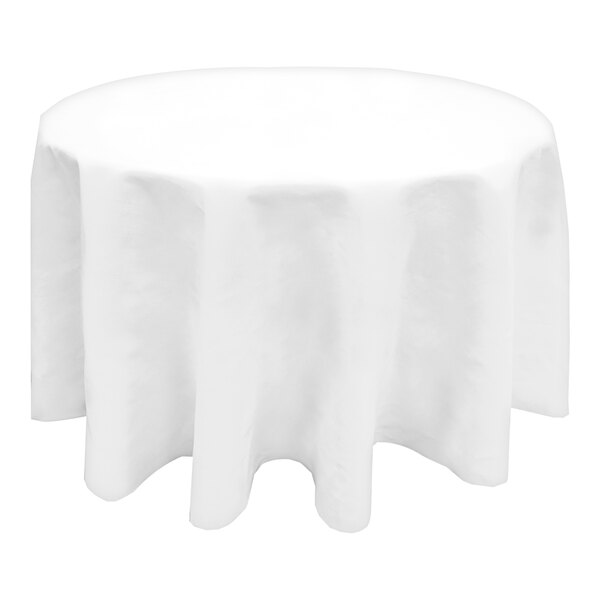 A white Snap Drape round table cover on a white surface.