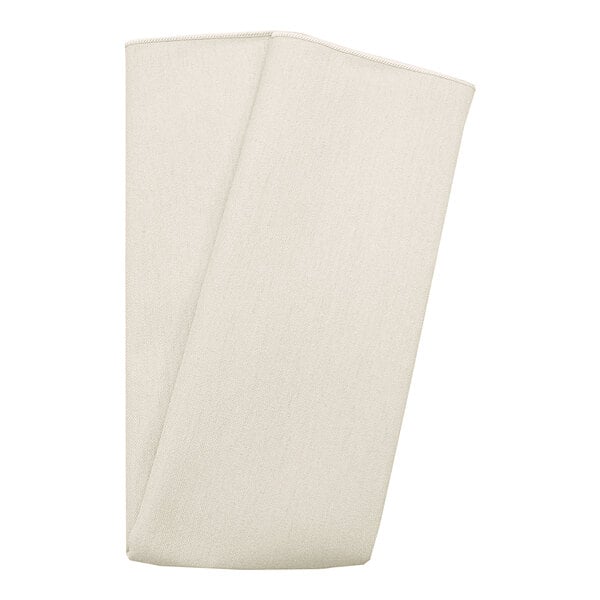 A folded ivory Snap Drape cloth napkin.
