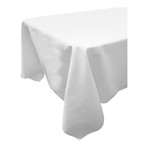 A close-up of a Snap Drape white square tablecloth on a table with a white background.