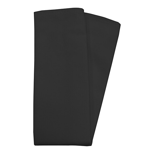 A folded black cloth napkin on a white background.