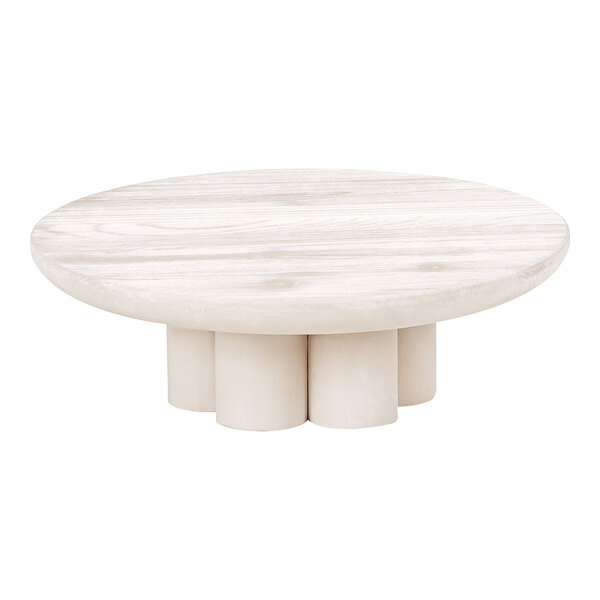 A Cal-Mil white-washed pine wood round display riser on a white round table.
