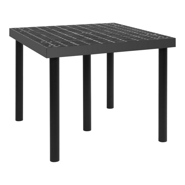 A black square Benchmaster platform display with metal legs and a metal grid top.