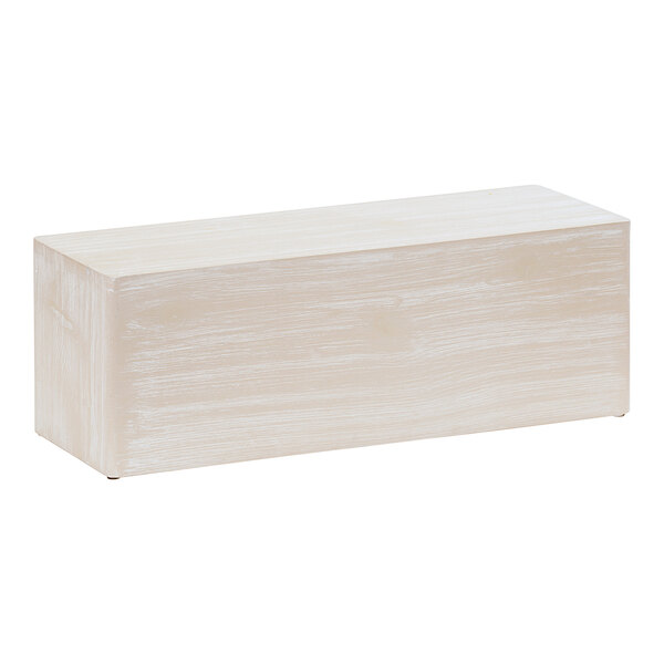 A white rectangular wood display riser.