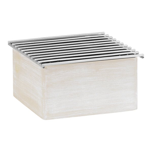 A white Cal-Mil box with a metal grate inside.