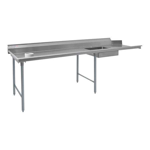 A stainless steel Eagle Group dishtable with sinks.