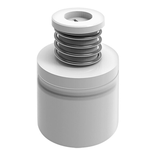 A white cylinder with a white circular object and metal spring inside.