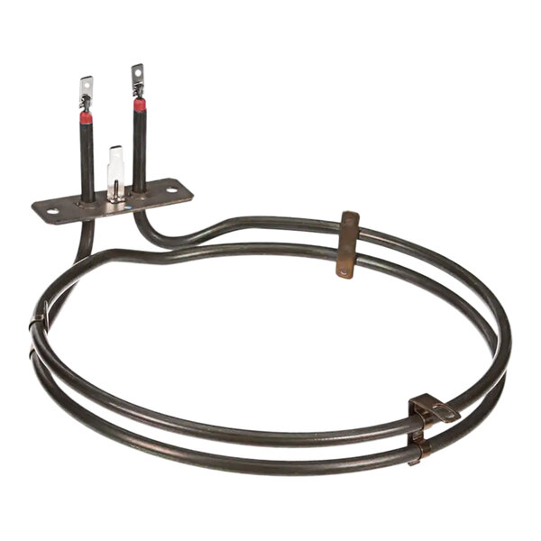A Moffat oven element, a circular metal object with two red wires.