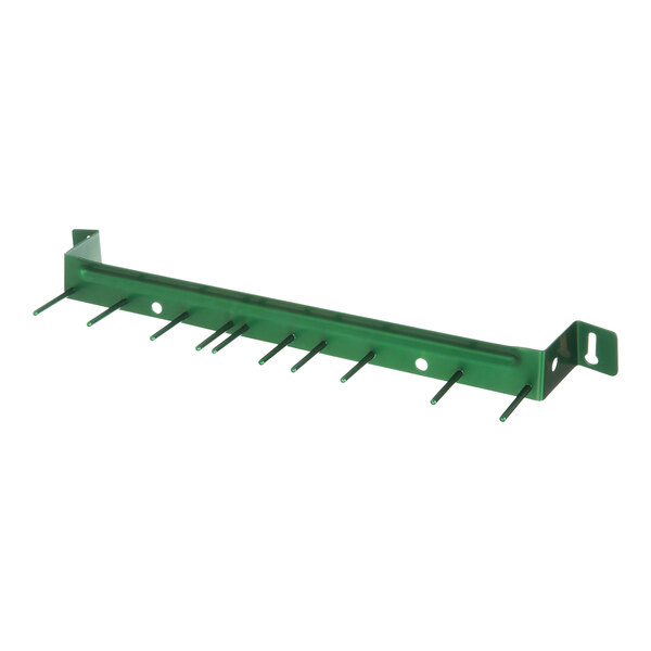 A green metal rack with holes for brushes.