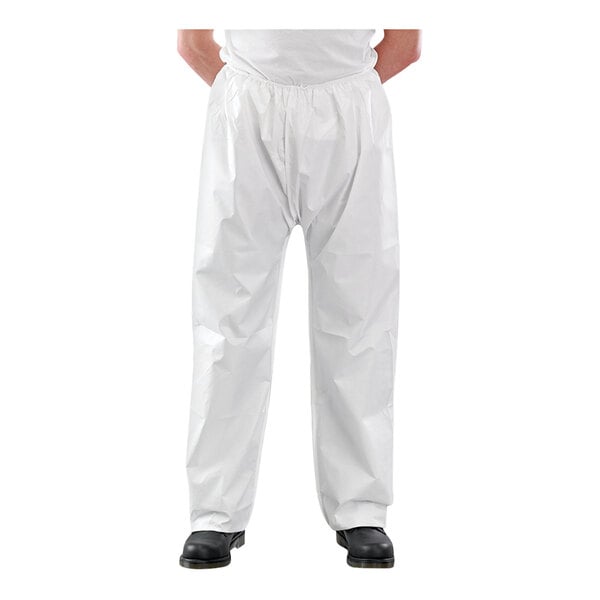 A person wearing white Ansell AlphaTec trousers.
