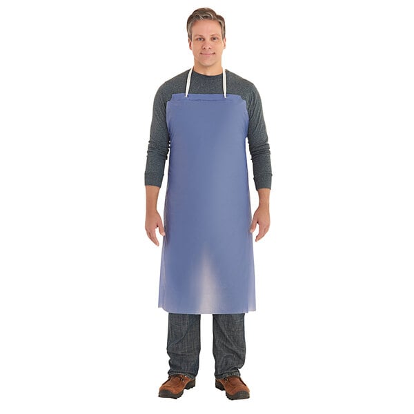 A person wearing a blue Ansell vinyl apron.