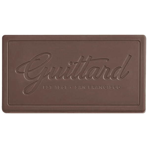 A brown rectangular Guittard dark chocolate bar with text.