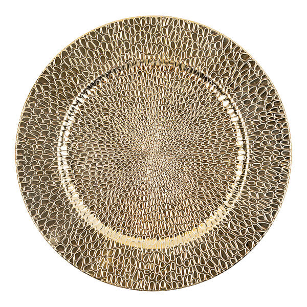 A white plastic charger plate with a gold raindrop pattern.
