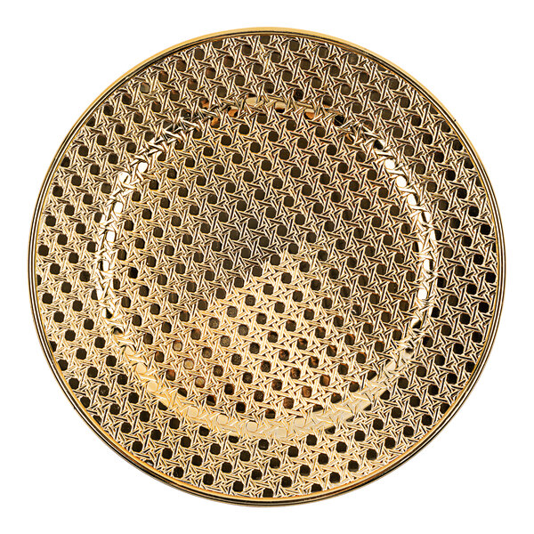 An American Atelier gold plastic charger plate with a pattern.