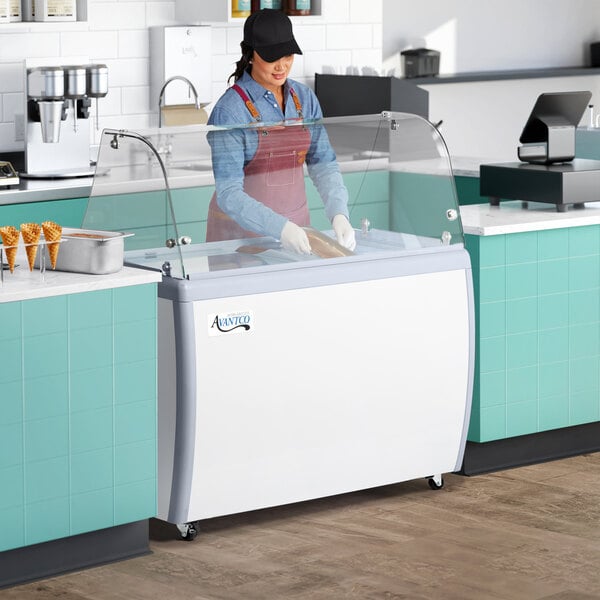 Avantco ADC-GEL-9C 49" Nine Pan Gelato Dipping Cabinet with Curved Sneeze Guard and Pans