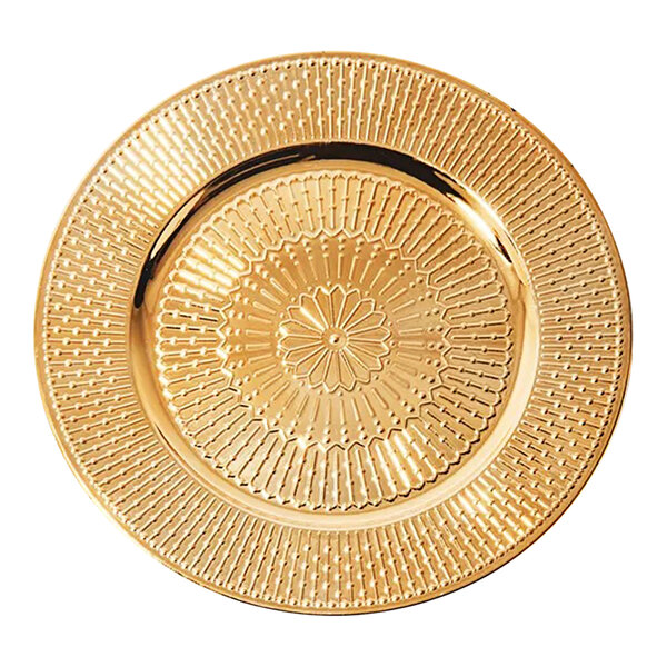 A close-up of an American Atelier gold plastic charger plate with a circular design.