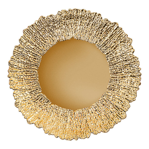 An American Atelier gold plastic charger plate with a circular design and a round center.