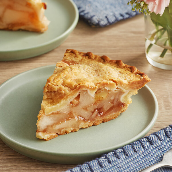 A slice of Chef Pierre apple pie on a plate.