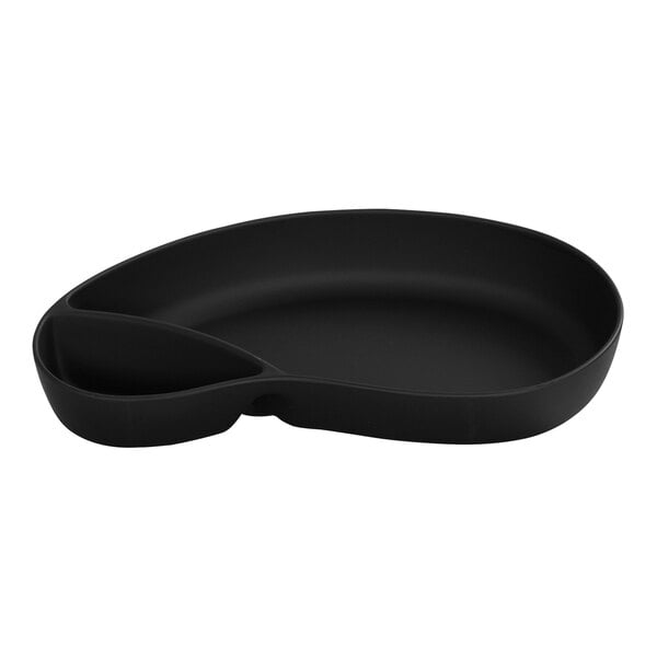 A black melamine 2-section chip and dip bowl on an oval tray.