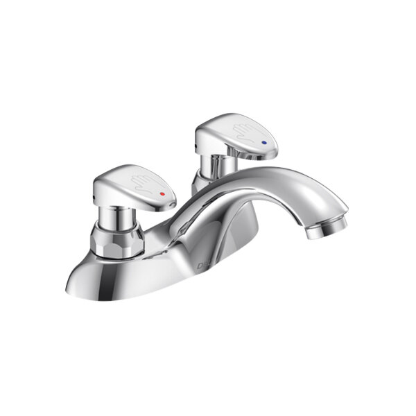 A chrome Delta metering faucet with push handles.