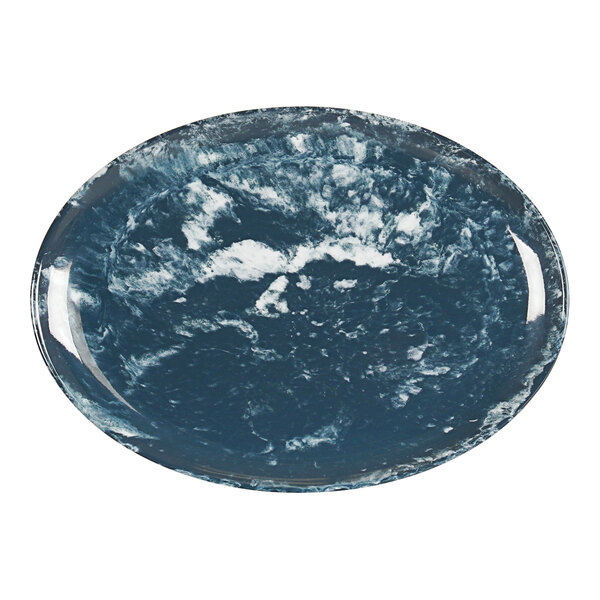 A blue and white Cal-Mil oval melamine platter.